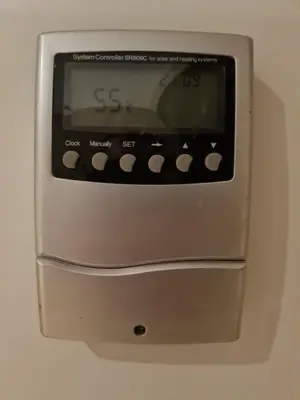 a clock is attached to a wall at 282 Guesthouse/Self-Catering in Centurion