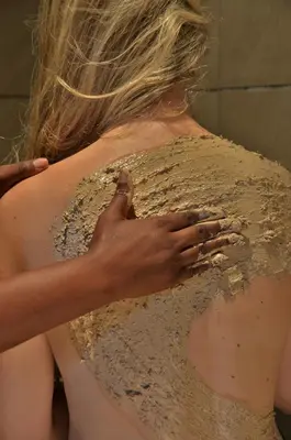 a woman in a dress with her back to the camera at Highgrove House Country Hotel, Restaurant, Farm & Spa in Hazyview