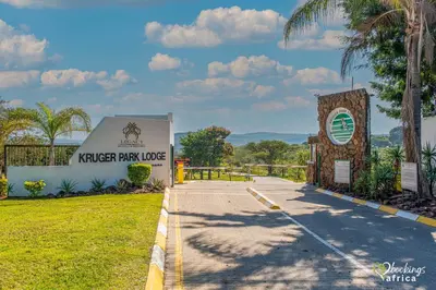 a sign at the entrance to a ranger park lodge at Kruger Park Lodge Unit No 252 with private pool in Hazyview