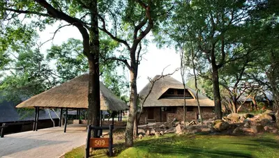 a hut with a sign in front of it at Kruger Park Lodge Unit No. 509 in Hazyview