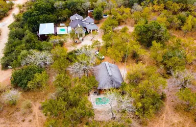 an overhead view of a house with a yard at Nanisto Bush Lodge in Marloth Park