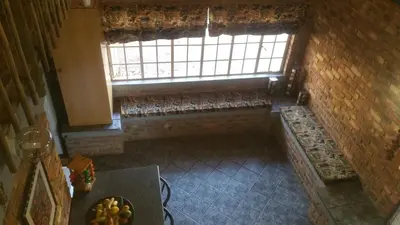 an overhead view of a room with a large window at Marlothii Safari House in Marloth Park