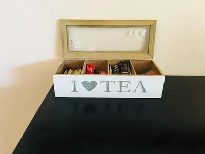a box with the words i love tea sitting on a table at Riverton Manor in Centurion