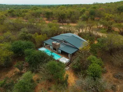 an overhead view of a house with a swimming pool at Kruger River Villas - LionsGate in Marloth Park