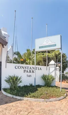 a sign for the entrance to a confederation park at Constantia Hotel and Conference Centre in Midrand
