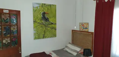 a room with a picture of a bird on the wall at 1322 Backpackers International in Pretoria
