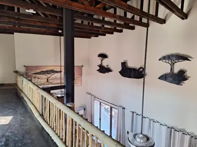 a hallway of a building with mushrooms on the wall at Dream Of Nature in Bela-Bela