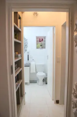 a bathroom with a white toilet in a room at 513 on Mulberry in Pretoria
