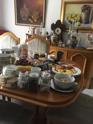 a wooden table with food on top of it at Sunninghill Sojourn in Kyalami