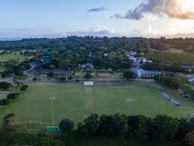 an aerial view of a park with a soccer field at ANEW Resort White River Mbombela in White River