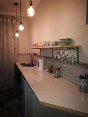 a kitchen with a sink and a counter top at MacNut Bed and Breakfast in Nelspruit