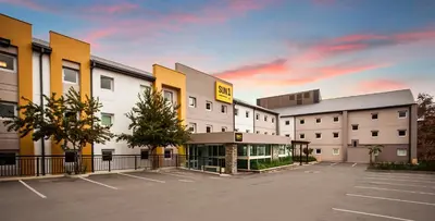a row of buildings in a parking lot at SUN1 PRETORIA in Pretoria