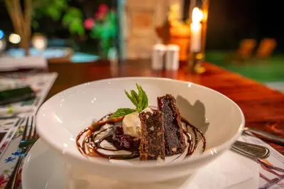 a white bowl of chocolate dessert on a table at Walkersons Hotel & Spa in Dullstroom