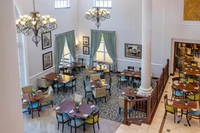 an overhead view of a restaurant with tables and chairs at Southern Sun Mbombela in Nelspruit