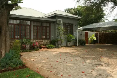 a house with a driveway in front of it at Purdy's Place in Louis Trichardt