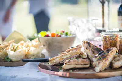 a table with a plate of food on a table at Makuwa Safari Lodge in Mbabat