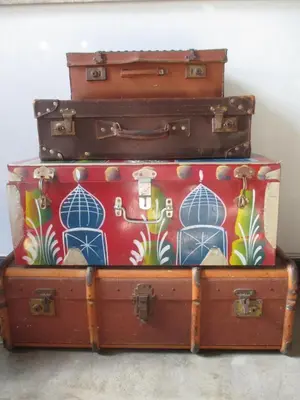 four suitcases stacked on top of each other at Utopia in Africa Guest Villa in Nelspruit