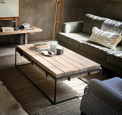 a living room with a couch and a coffee table at Nextdoor Kruger in Marloth Park