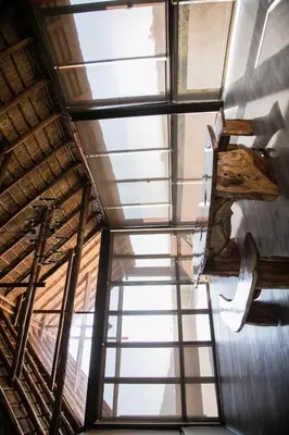 a view from the top of a room with windows at Kuwisa Lodge in Bela-Bela