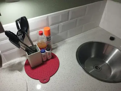 a kitchen counter with a sink and a counter top with a counter at Serendipity NO TV in Polokwane