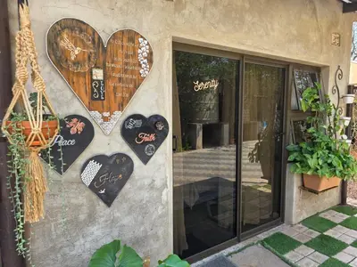 a wall with hearts on the side of a building at Serendipity NO TV in Polokwane