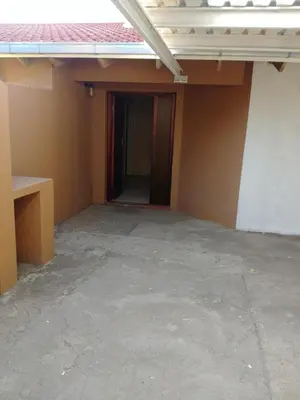 an empty room with a door in a building at 22 on Nicol in Secunda