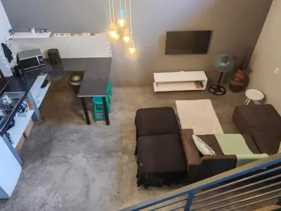 an overhead view of a living room with a couch and a tv at Arend Cottage in Nelspruit