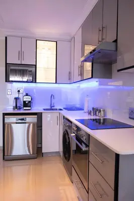 a kitchen with a sink and a dishwasher at The Wilcrest Apartment in Randjesfontein