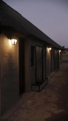 a row of houses with lights on the side of them at Arendskop in Pretoria