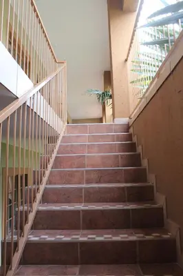 a set of stairs in a building at Batter Boys Guest House in Pretoria