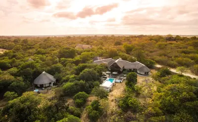 an aerial view of a house with a swimming pool at Vuyani Safari Lodge in Hoedspruit
