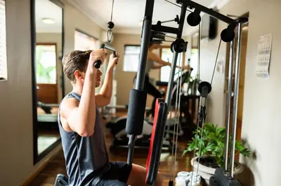 a man working out in a gym at Village Ridge Stays in Pretoria
