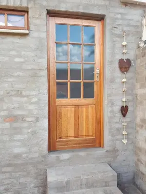 a wooden door on the side of a building at Oppermans Villa in Pretoria