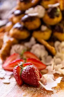 a close up of strawberries on a table at Treur River Lodge in Moremela