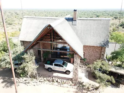 a house with a car parked in front of it at Itaga View, Mabalingwe in Mabula