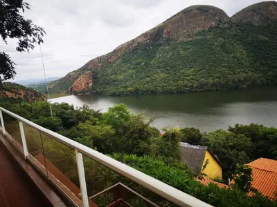 a view of a river between two mountains at Letamong in Hartbeespoort