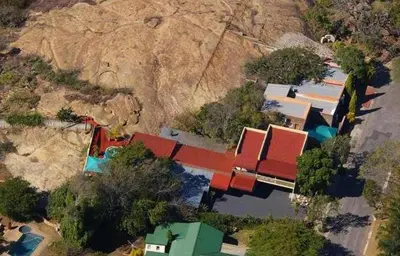 an overhead view of a building with red roofs at Ingwe Guesthouse in Nelspruit