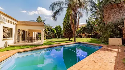 a swimming pool in the backyard of a house at See You There Accommodation 1 in Centurion