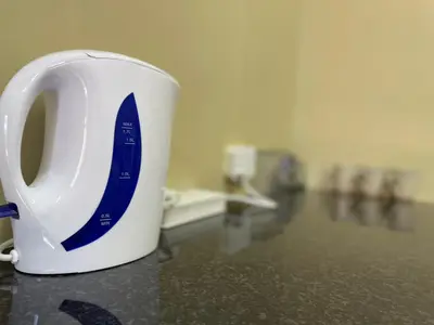 a coffee cup sitting on top of a counter at 4 on Sirius in Polokwane