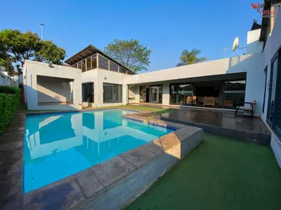 a swimming pool in the backyard of a house at ANISA GUESTHOUSE in Thohoyandou