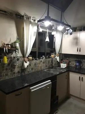 a kitchen with a sink and a counter top at Twenty Four Mabalingwe Nature Reserve in Mabula