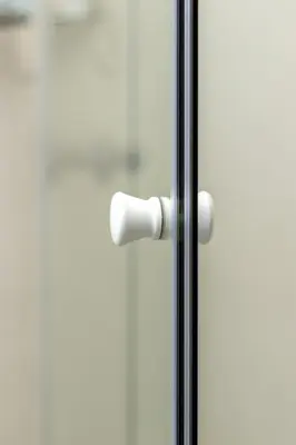 a glass door with a door knob on a shower at Villa Roma - Luxury Accommodation in Centurion