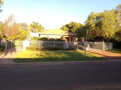 a white fence in front of a house at 273 Rhino retreat-solar backup in Centurion