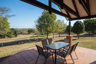 a table and chairs sitting on a patio at Greenwaywoods Unit 11 in White River