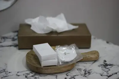 a box of tissues and a box of tissues on a table at Ecolux Boutique Hotel in Komatipoort