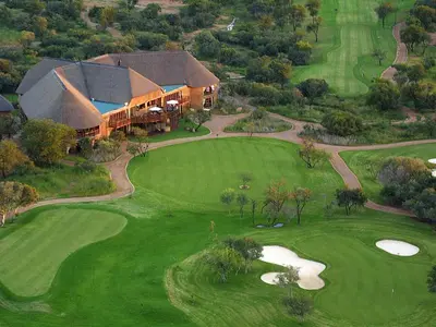 an aerial view of a golf course with a house at Zebula - HT1 - 5 Bedroom Holiday Home in Mabula
