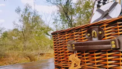 a brown wicker basket with a tag on it at Rocky Hollow Lodge in Pretoria