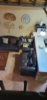 an overhead view of a living room with a table and chairs at Mopani Villa in Marloth Park