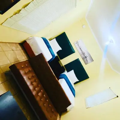an overhead view of a bed in a hotel room at Maite Villa Lodge in Thohoyandou