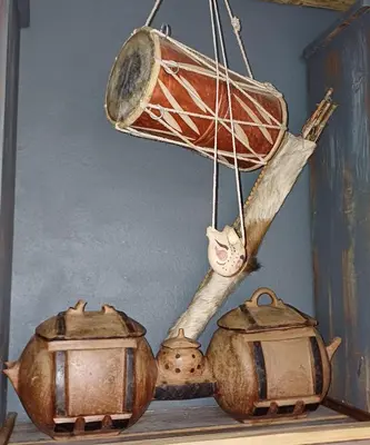 a shelf with pots and pans on it at Wooden Creek Estate in Kempton Park